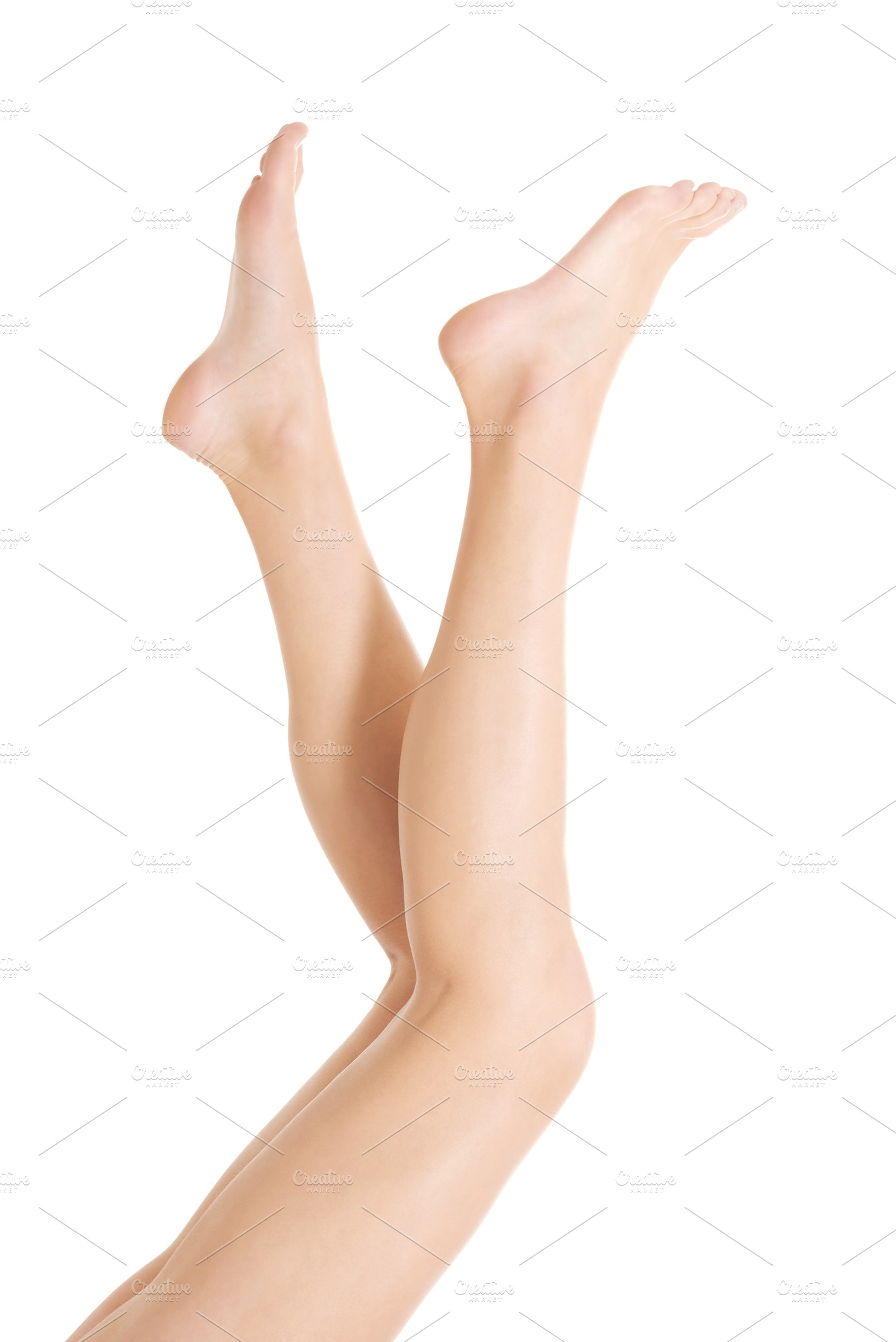 Beautiful smooth female legs featuring female, skin, and beautiful, a Person Photo by PhotoMediaGroup