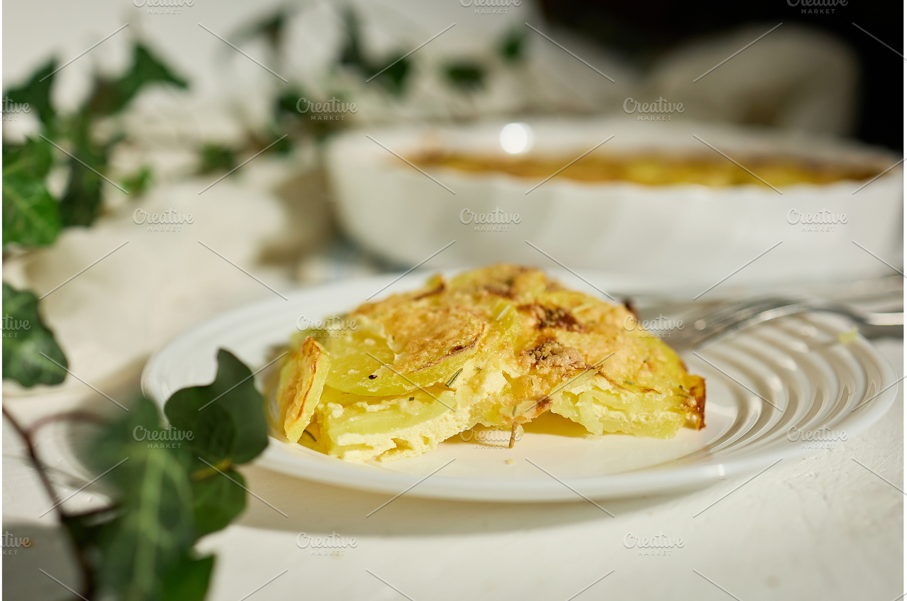 Creamy potato dish served in a cozy, a Food & Drink Photo by IlliaBondarPhotography