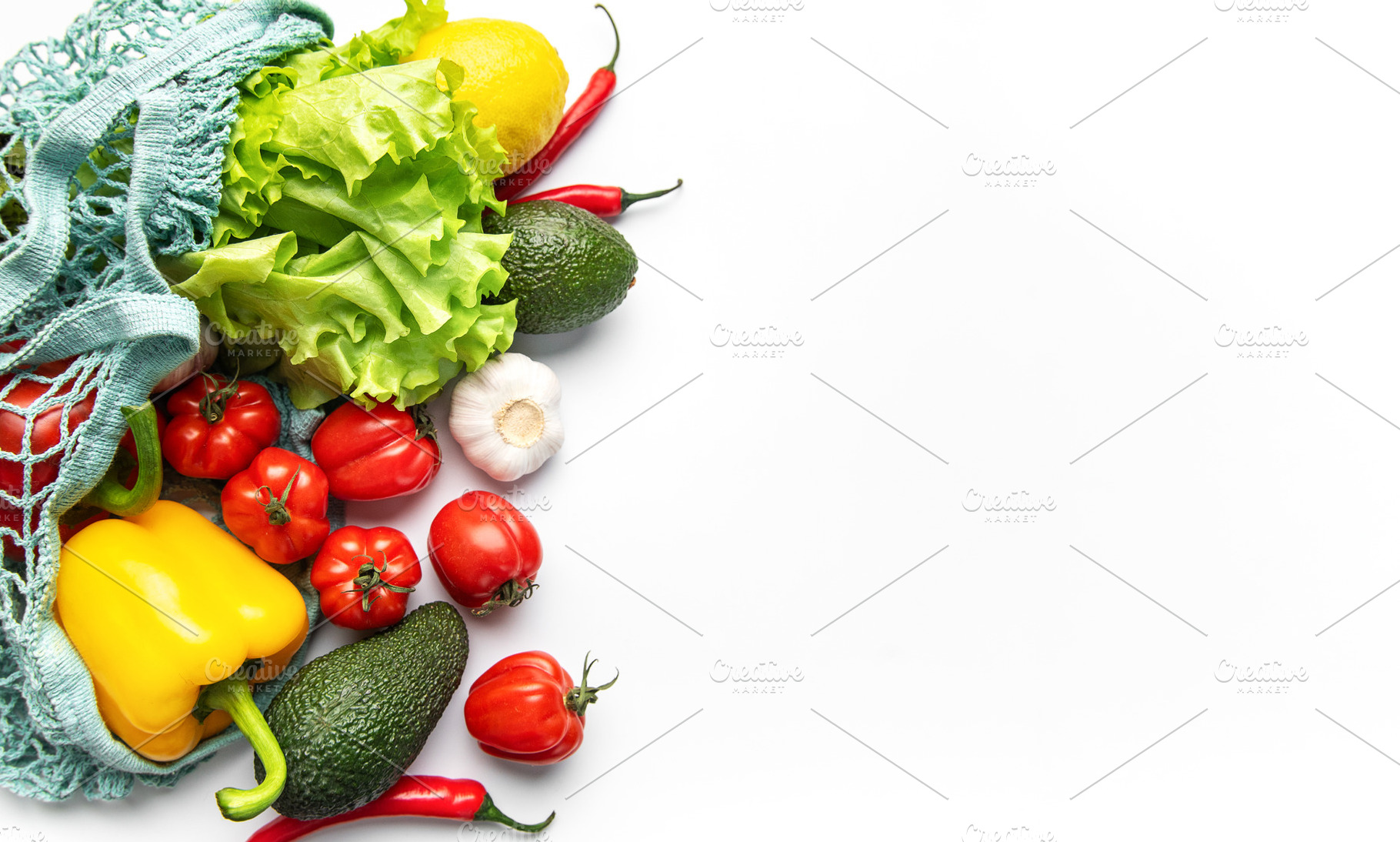 Fresh vegetables in reusable net bag for zero waste, a Food & Drink Photo by Olena Rudo