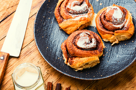 Cinnabons,bun with cinnamon, a Background Photo by MLunov MLunov