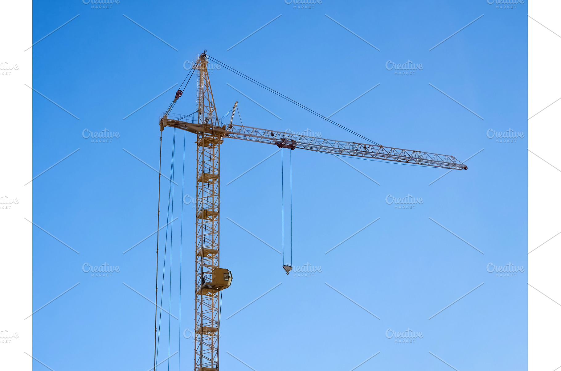 Two large cranes stand tall against, an Industrial Photo by darksoul72
