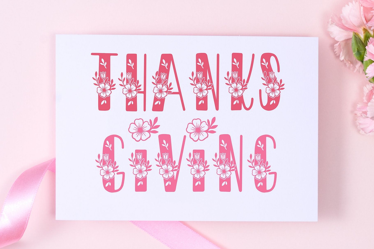 Floria – Floral Decorative Font, a Symbol Font by AnningArts (Photo 2 of 7)