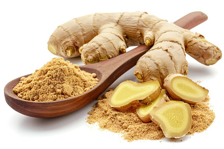 Ground dry ginger in wooden spoon isolated on white background, a Food & Drink Photo by AlyaAnd
