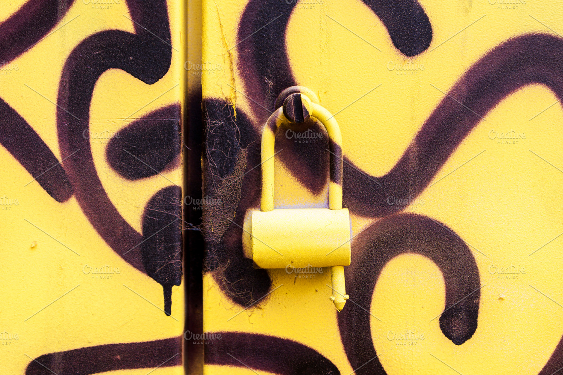 Graffiti painted doors with lock, an Abstract Photo by BOOCYS
