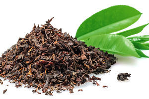Heap of dried tea and fresh tea leaf, a Food & Drink Photo by Volff
