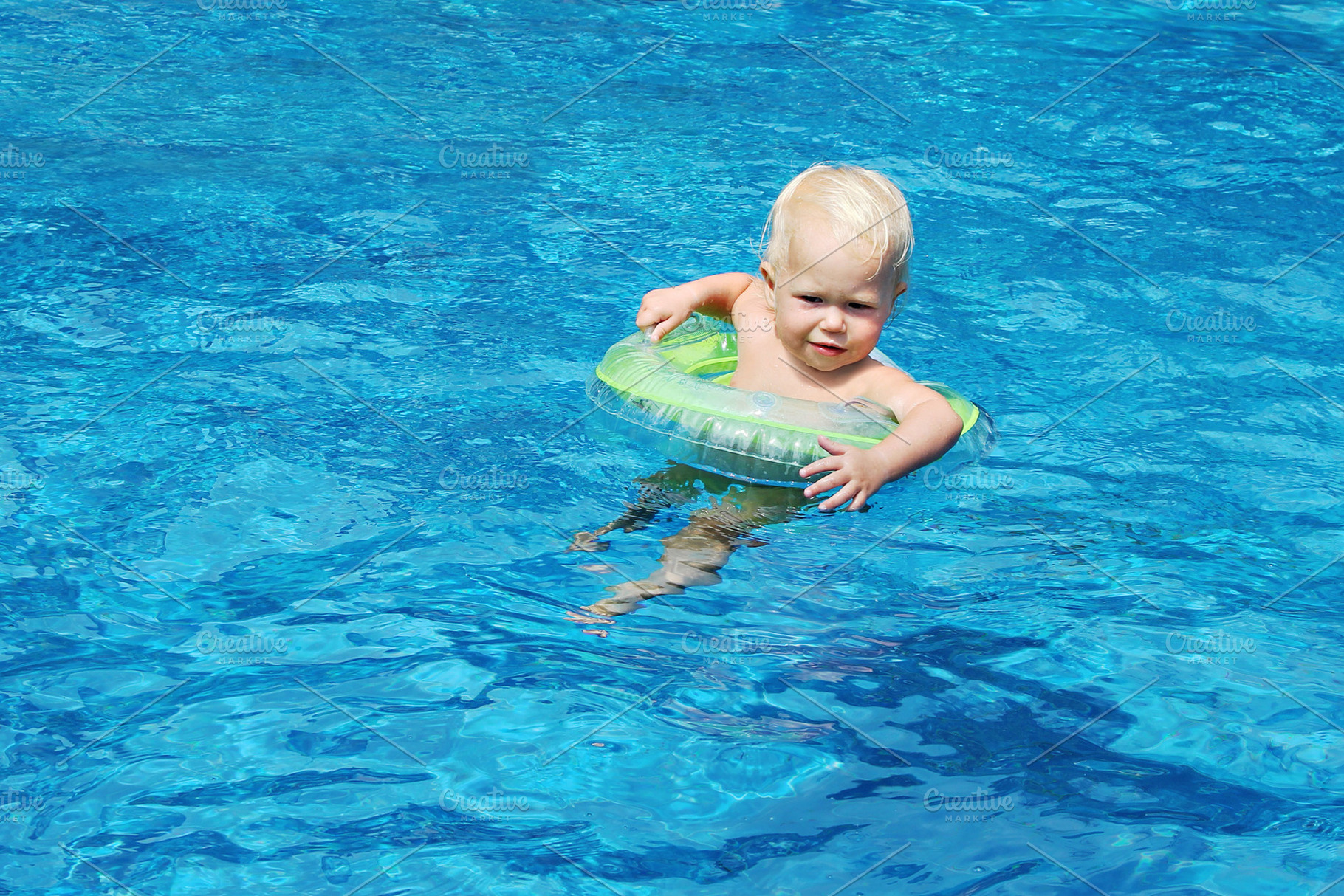 Baby swimming, a Photo by saiko3p