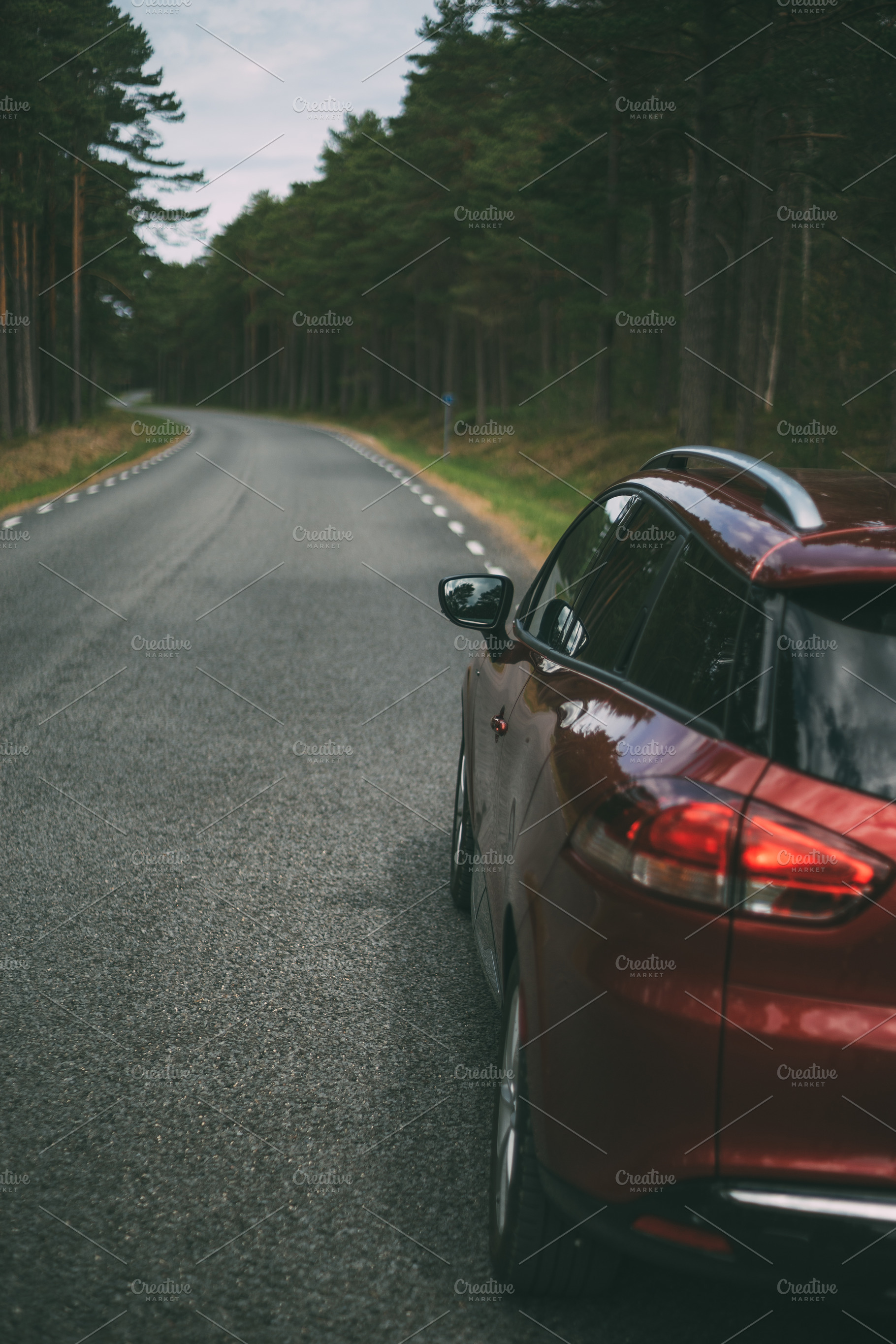 Car on winding road, a Transportation Photo by Alex Polo