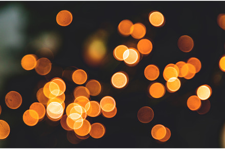 Yellow bokeh christmas on black, an Abstract Photo by yanadjana