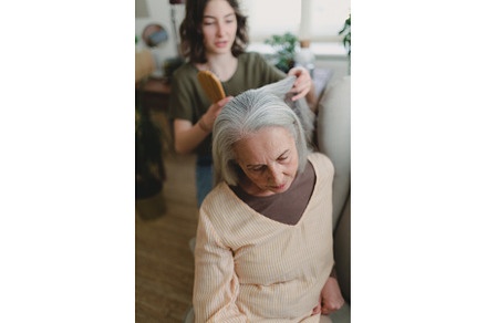 Teenage girl brushing her, a Person Photo by HalfPoint