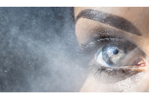 A close-up of an eye with vibrant, an Abstract Photo by Igor Tichonow