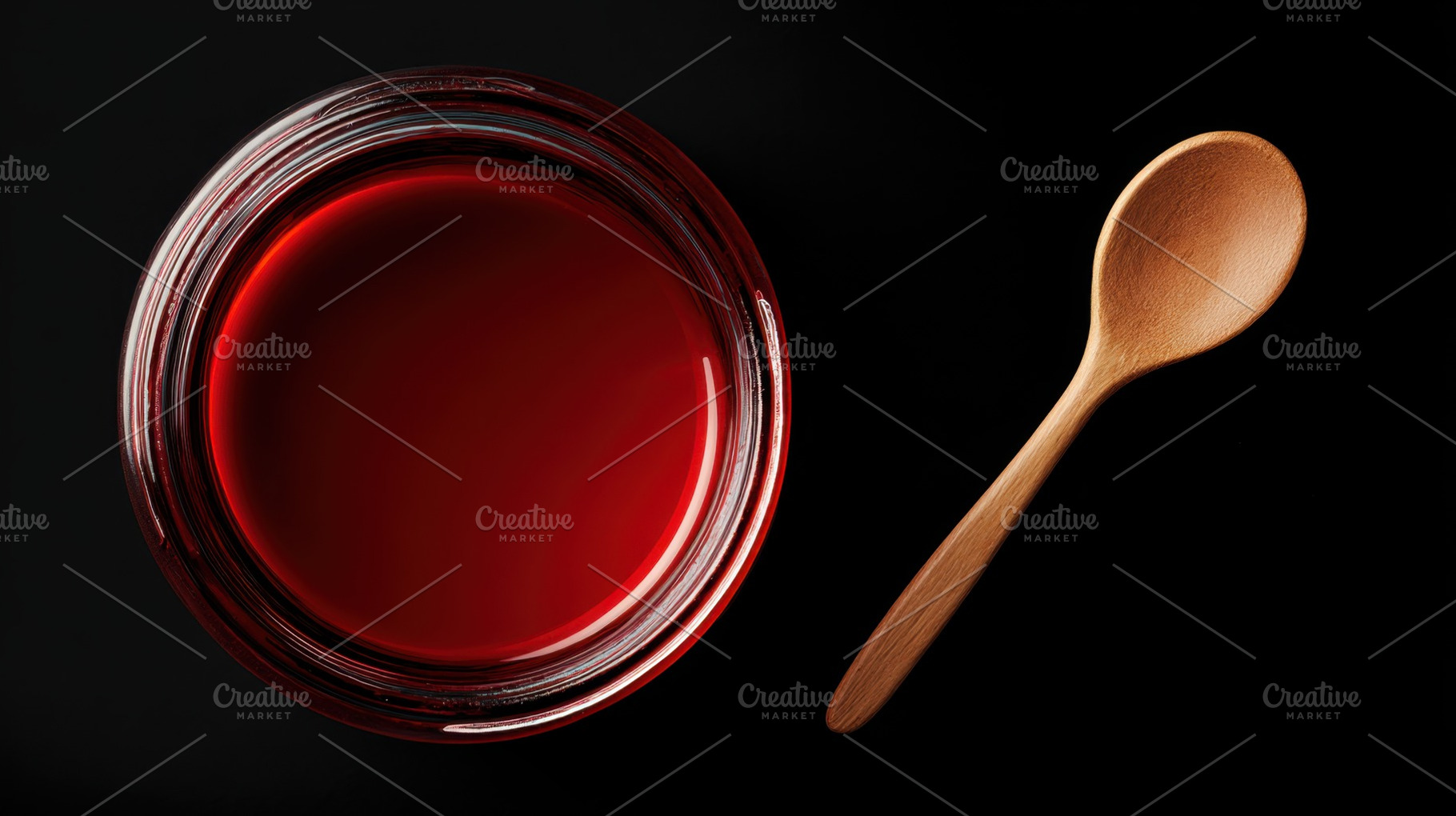 Red liquid in jar with wooden spoon, a Photo by Beautiful things