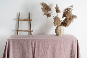 Home decor concept, table with lilac tablecloth