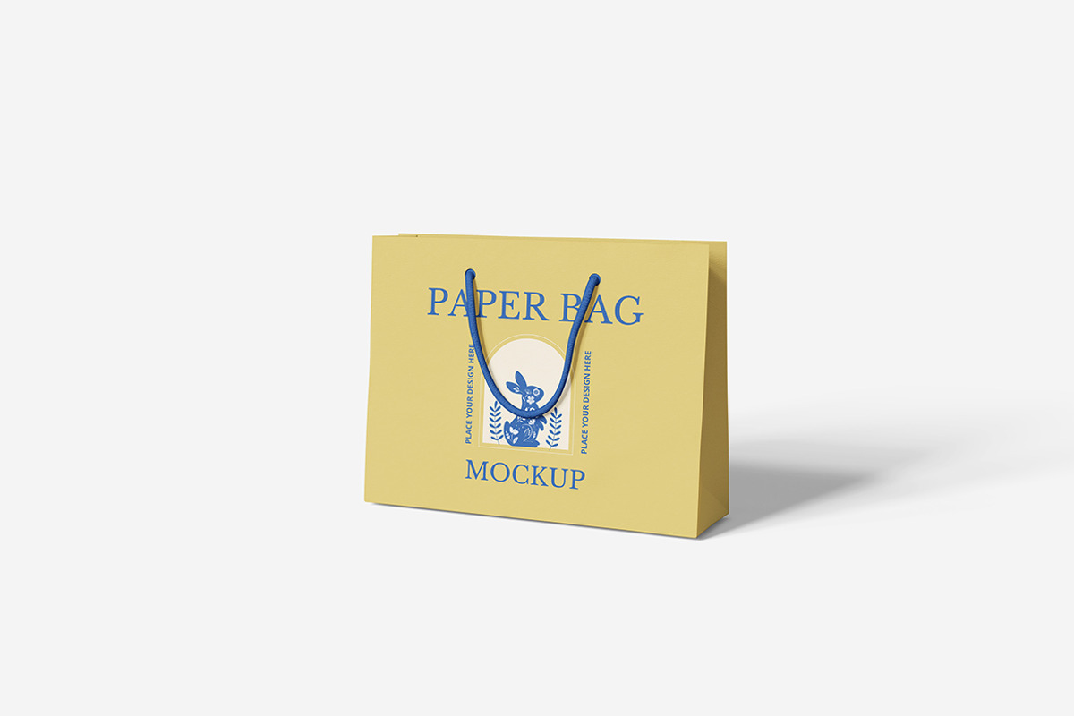 Paper Bag Mockup, a Merchandise Mockup by Indah (Photo 4 of 6)