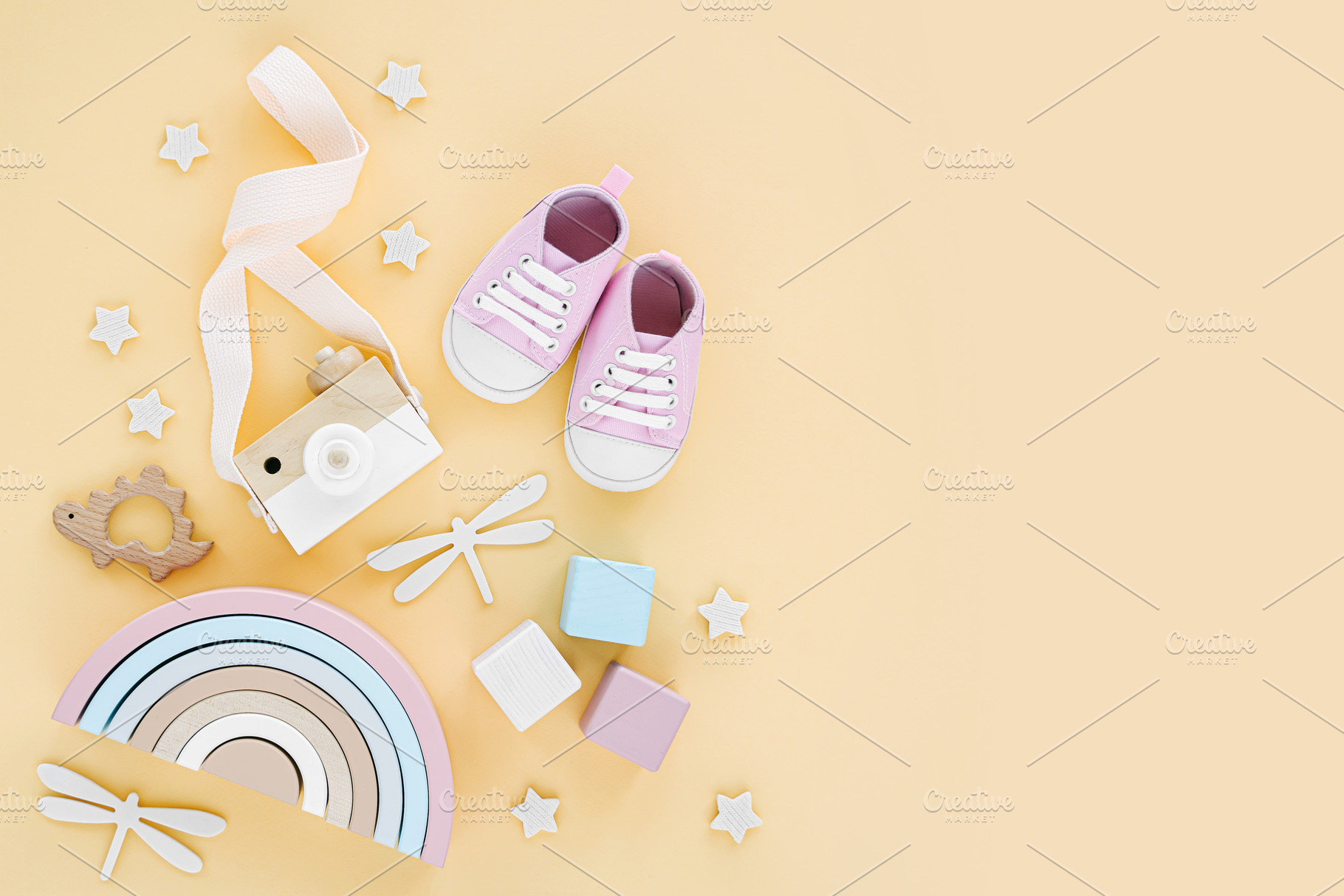 Baby slippers and toys, an Abstract Photo by Maria Igisheva