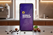 Mobile Mockup in Kitchen, a Product Mockup by OneVectorStock (Thumbnail 1 of 2)