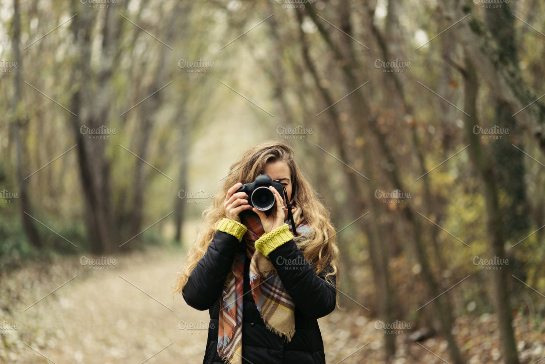 Woman taking photos at forest containing autumn, photos, and photographer, a Person Photo by Pardina Photography