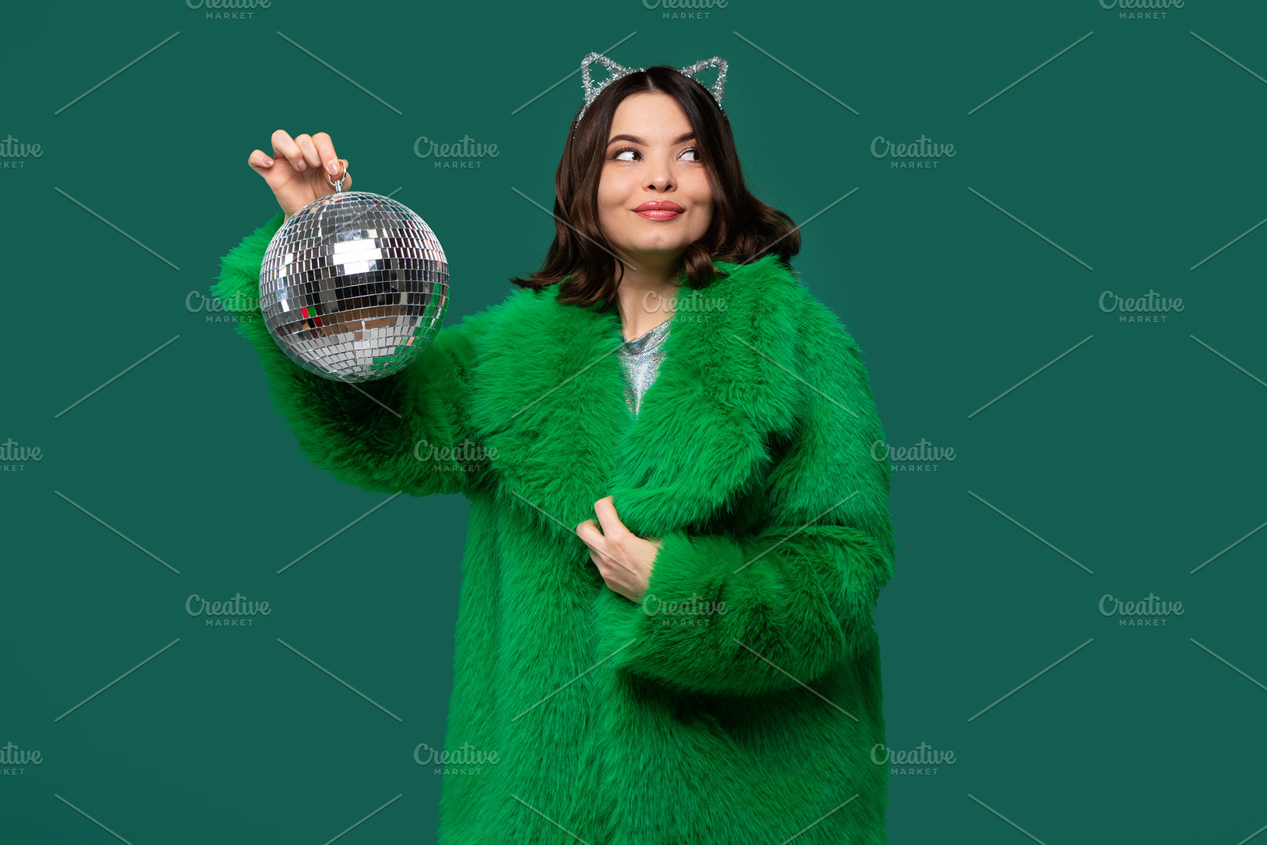 Playful woman in green fur coat look, a Person Photo by Elena Vagengeim