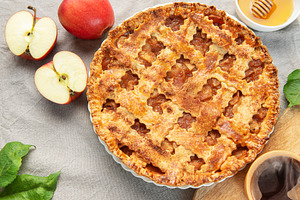 Delicious homemade apple pie with honey and coffee enjoyed durin, a Food & Drink Photo by Olena Rudo