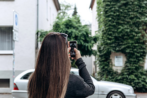 The girl on the street takes stock photo containing tourism and tourist