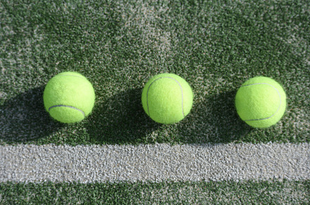 Close up of a padel and tennis court featuring padel, activity, and