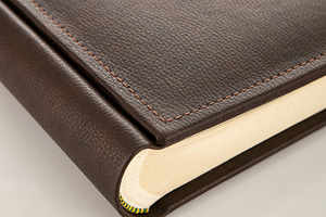 Elegant brown leather photo album showing high quality binding, an Abstract Photo by Antonio Gravante Market