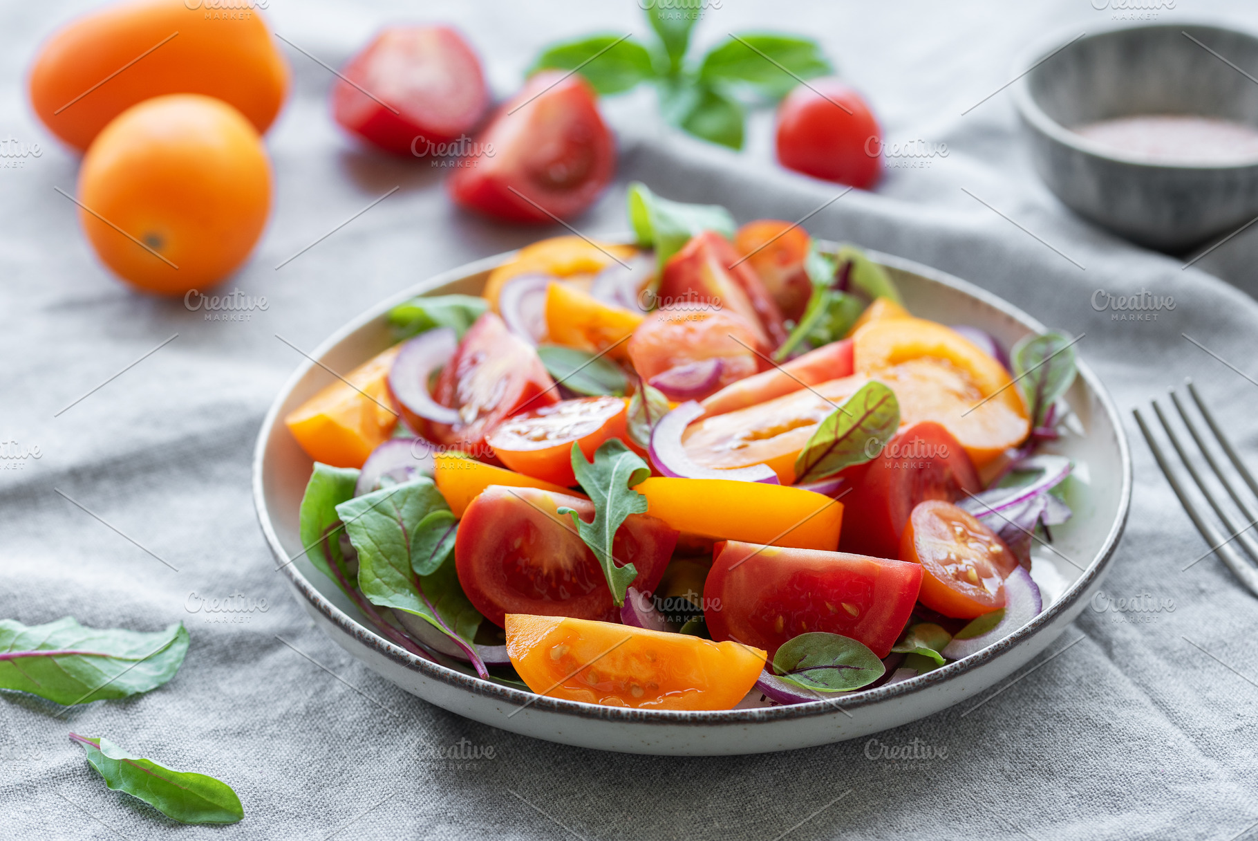 Green salad from leaves and tomatoes, a Food & Drink Photo by Olena Rudo