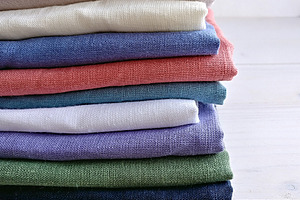 Pile of linen fabrics stock photo containing linen and fabric