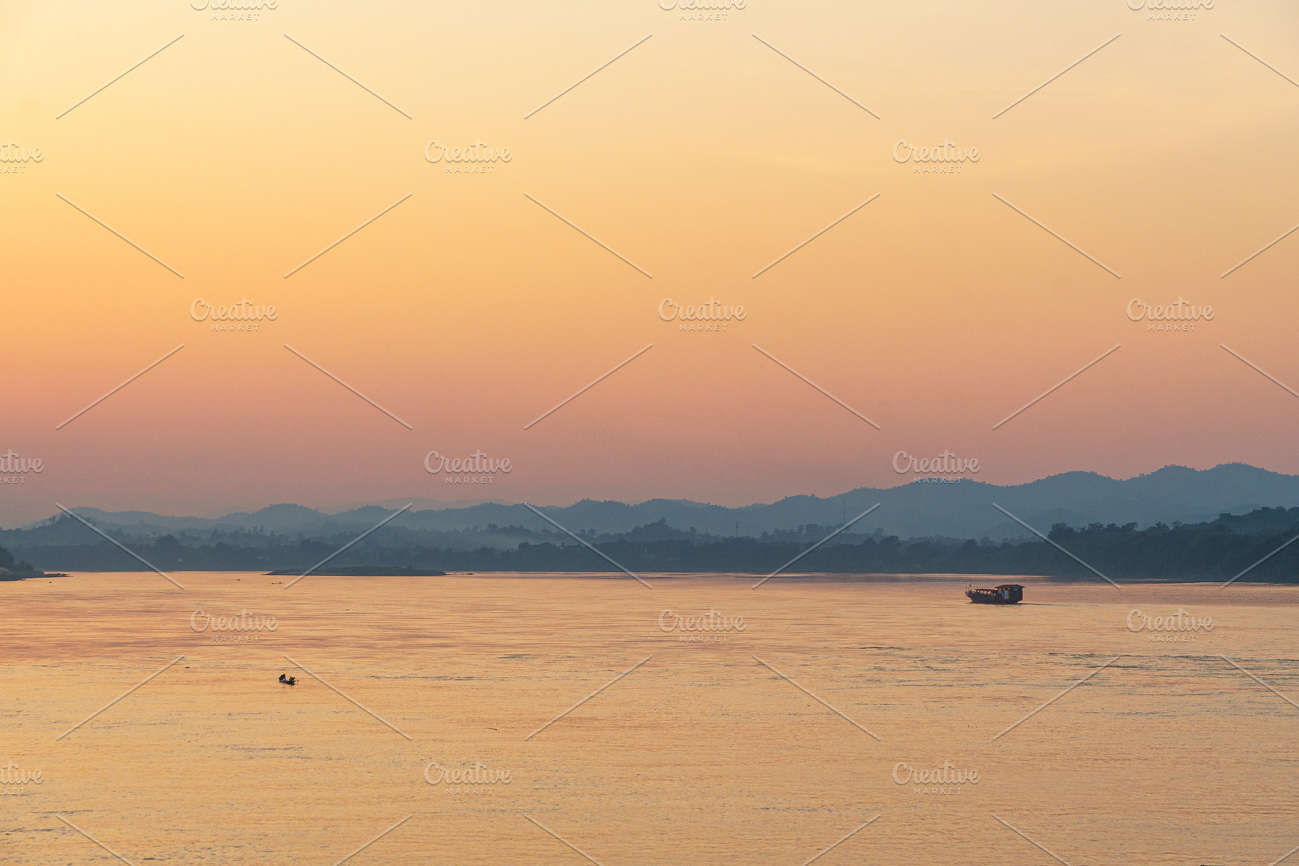 serene sunset over river, with soft orange and pink hues reflecting on water. S, a Photo by a454