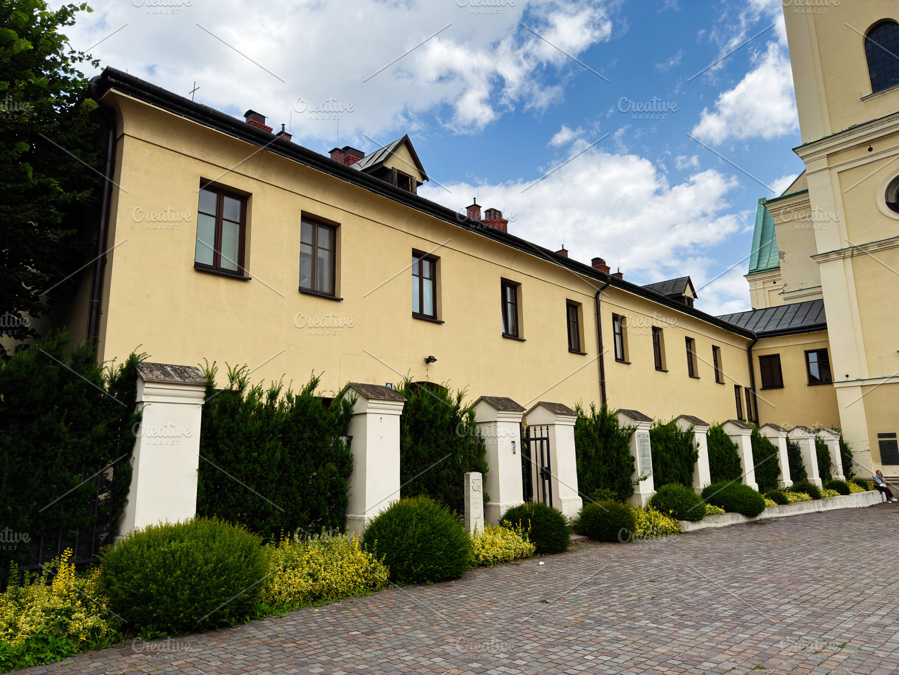 Historic Church of the Bernardine Friars courtyard and long beig, a Photo by AS photostudio