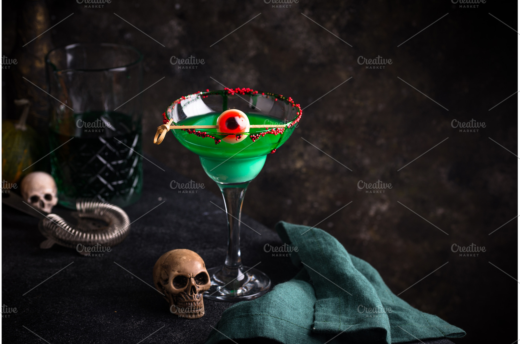 Eerie green Halloween cocktail with, a Food & Drink Photo by Yulia Furman