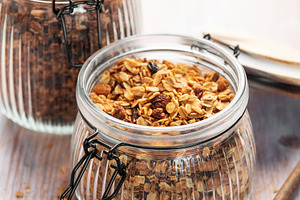Homemade granola cereal with nuts and dried fruits, a Food & Drink Photo by Olena Rudo