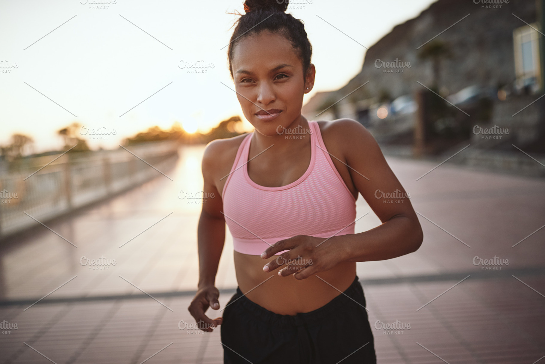 Fit young woman running on a promenade in the morning, a Sports & Recreation Photo by Stefan & Janni