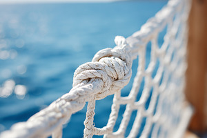 Close up of a nautical rope knot on, a Nature Photo by MistyDay