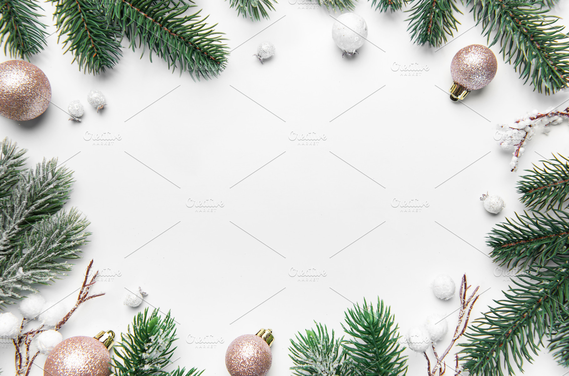 Christmas frame with pine branches and ornaments on white backgr, a Holiday Photo by Olena Rudo