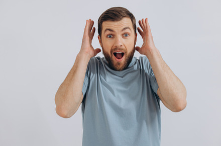 Portrait of a modern bearded middle-aged man in a blue t-shirt s, a Person Photo by Cherkas Photography