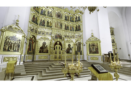 Wall of golden icons in church. Clip, a Holiday Photo by Media Whale Stock