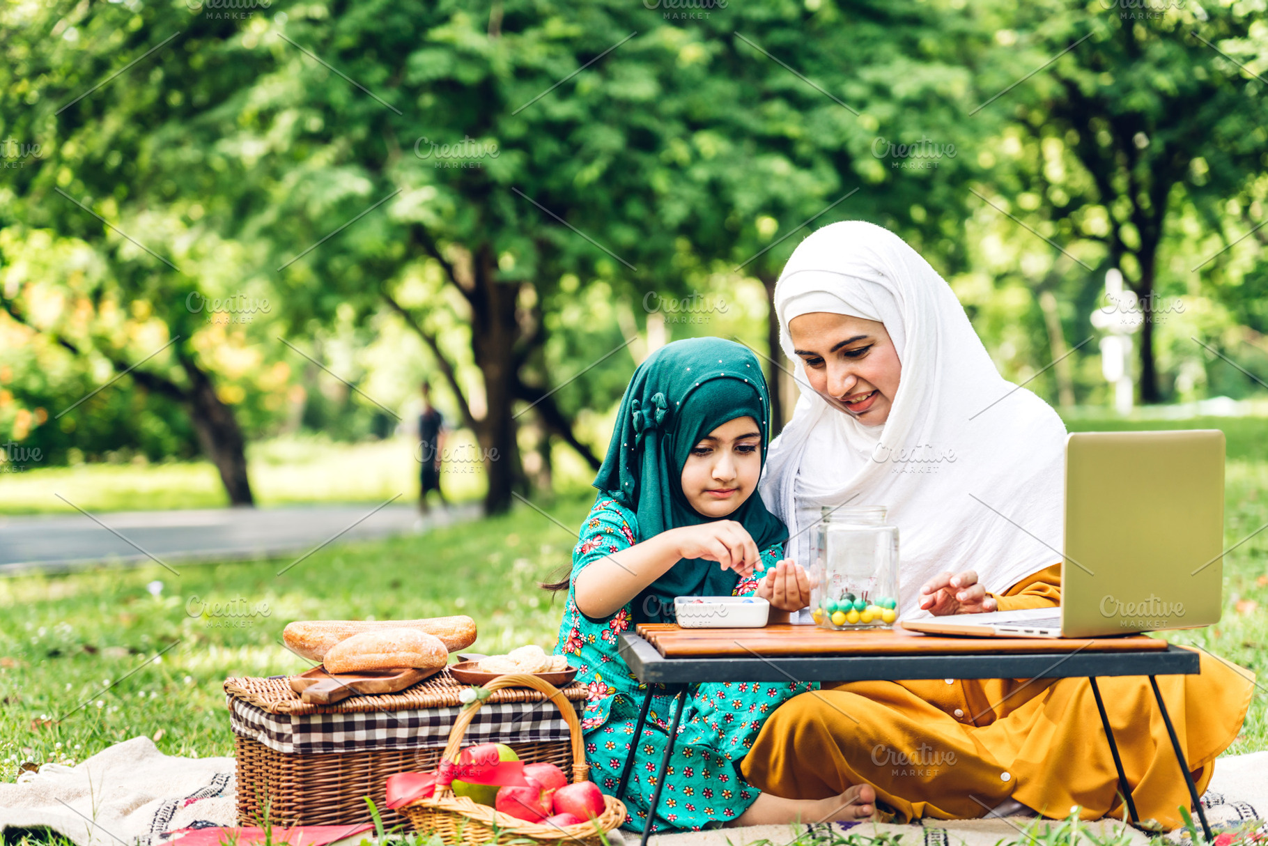 Portrait happy love asian muslim family mother teach little daug, a Person Photo by Art_Photo