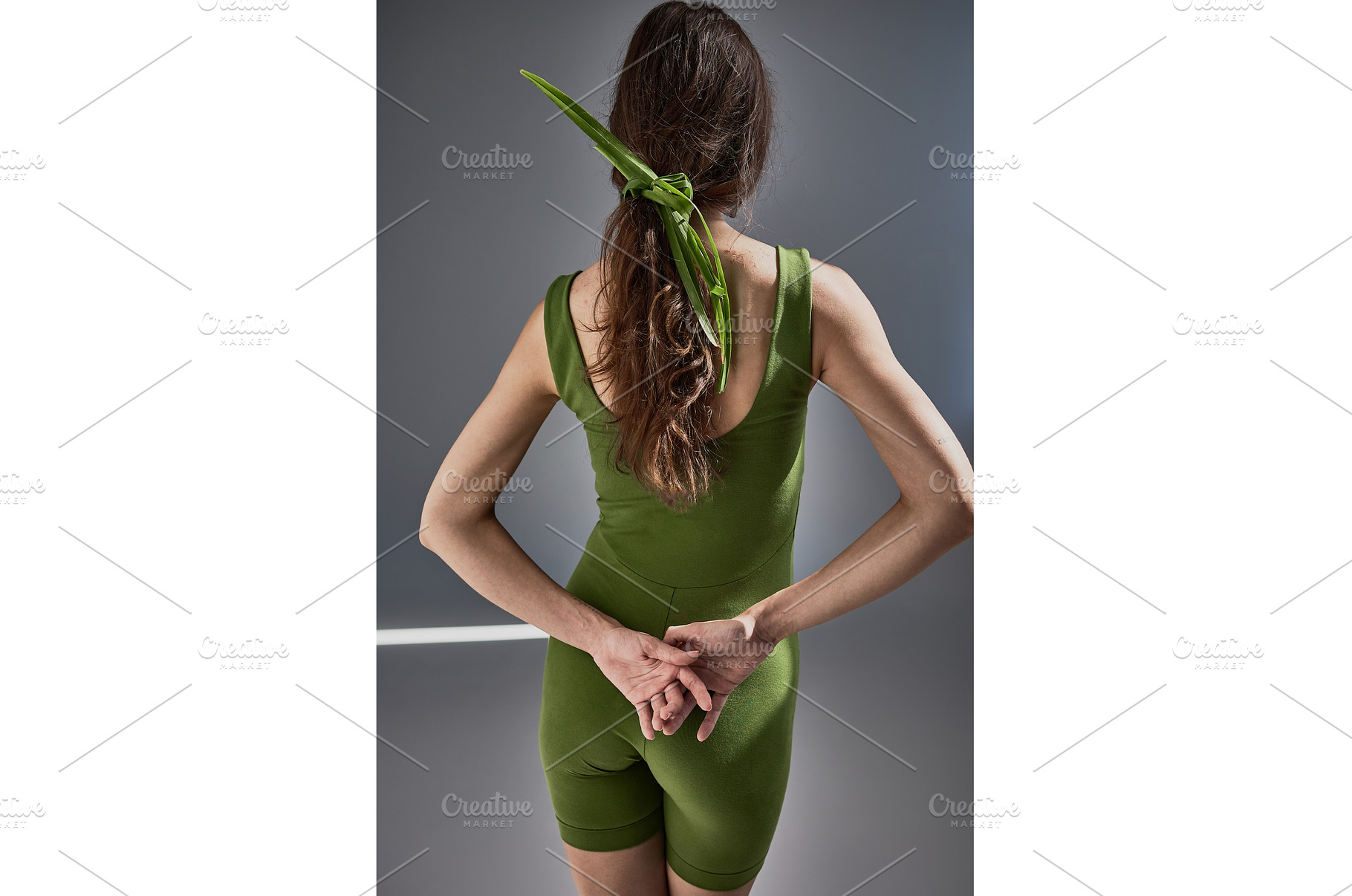 Graceful woman in green attire with, a Beauty & Fashion Photo by wip3out