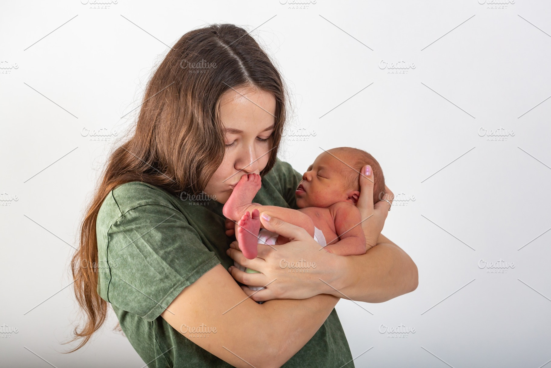 Mother and baby kissing and hugging containing baby, mother, and mom, a Person Photo by coob.kz