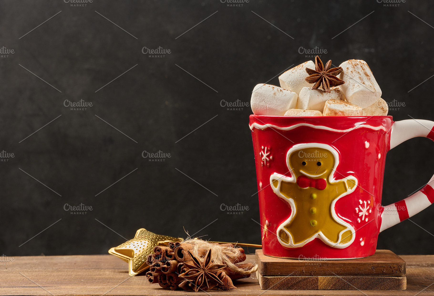 Hot chocolate in a red Christmas mug with a gingerbread man, mar, a Food & Drink Photo by ndanko