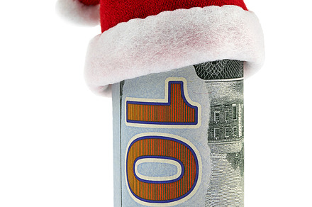 A hundred dollar roll in santa hat stock photo containing christmas and money, a Holiday Photo by HighRes Pictures