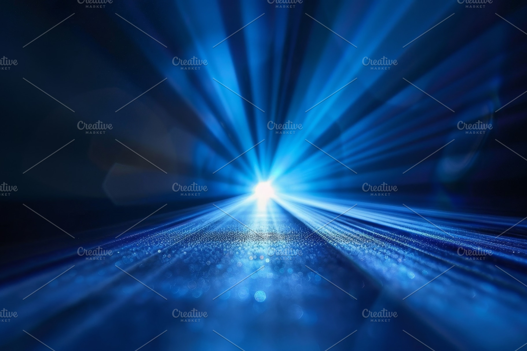 Vivid blue rays radiate outward from, a Photo by Tanuart