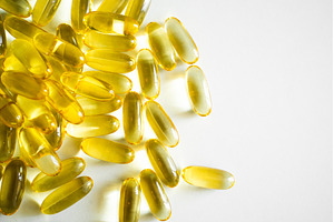 Close-up of scattered yellow fish, a Health & Medical Photo by volodymyrshtun13795