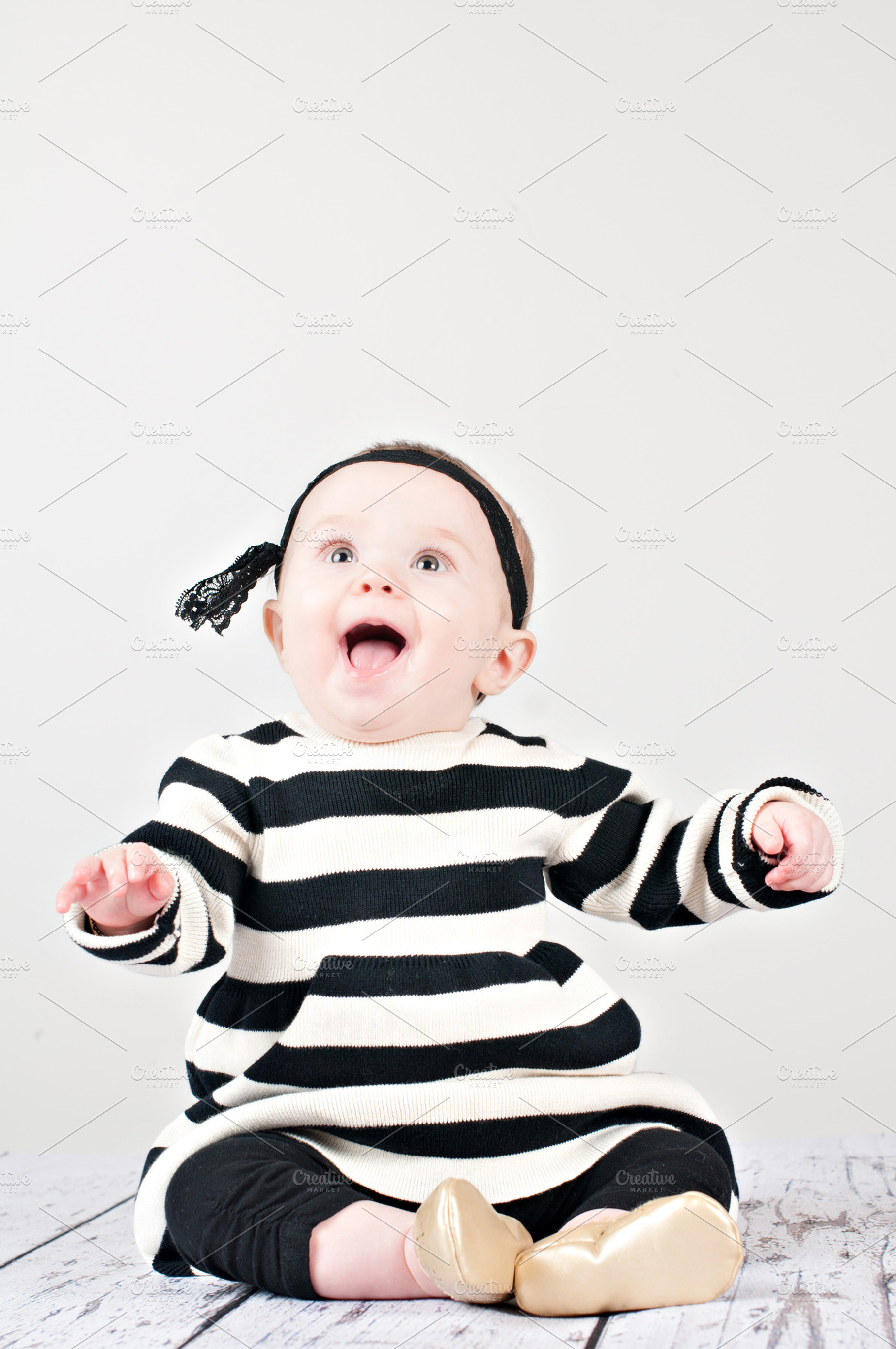 Happy baby stock photograph, a Person Photo by Persnickety Prints