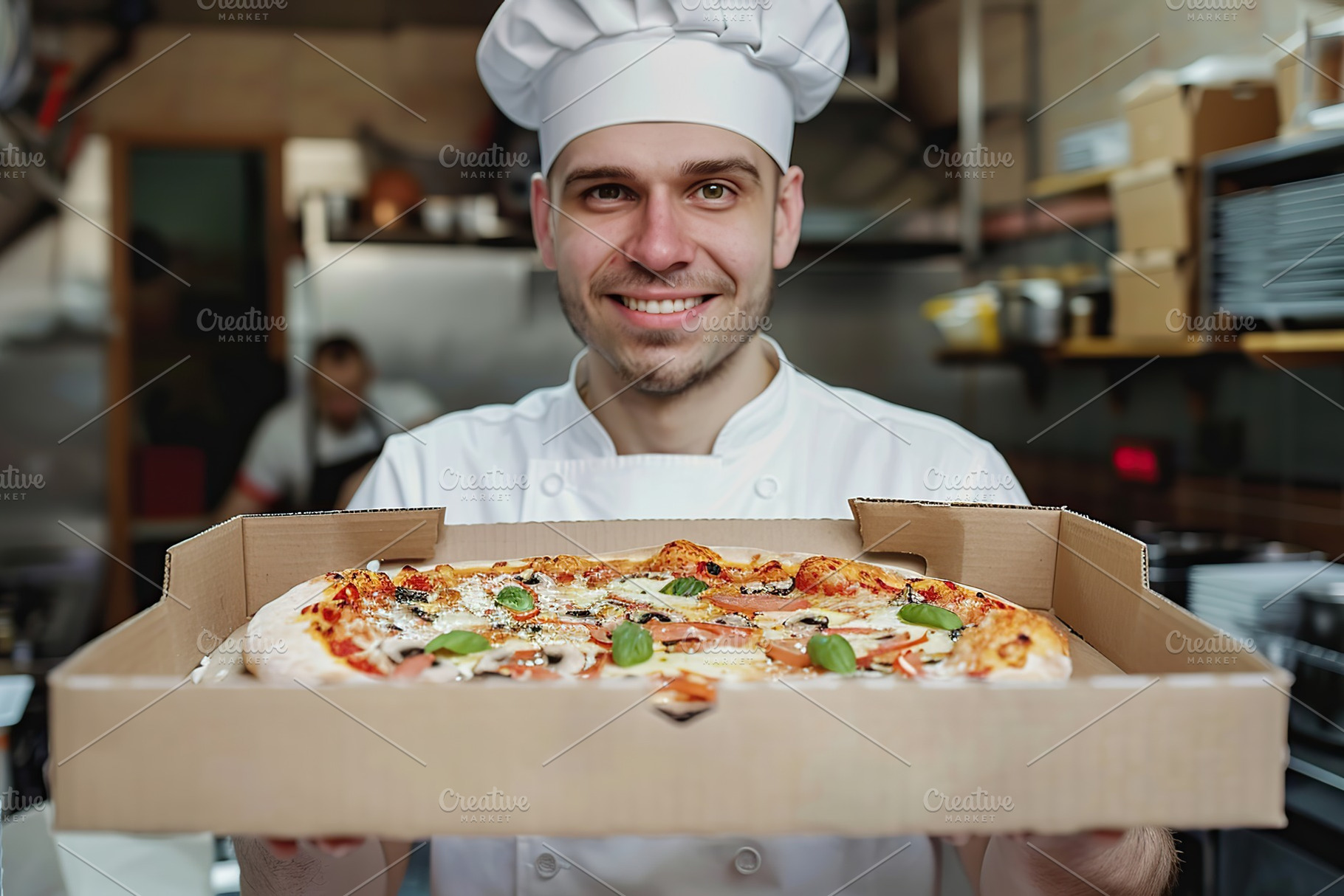 Male chef with hot pizza in restaurant, a Food & Drink Photo by AlyaAnd