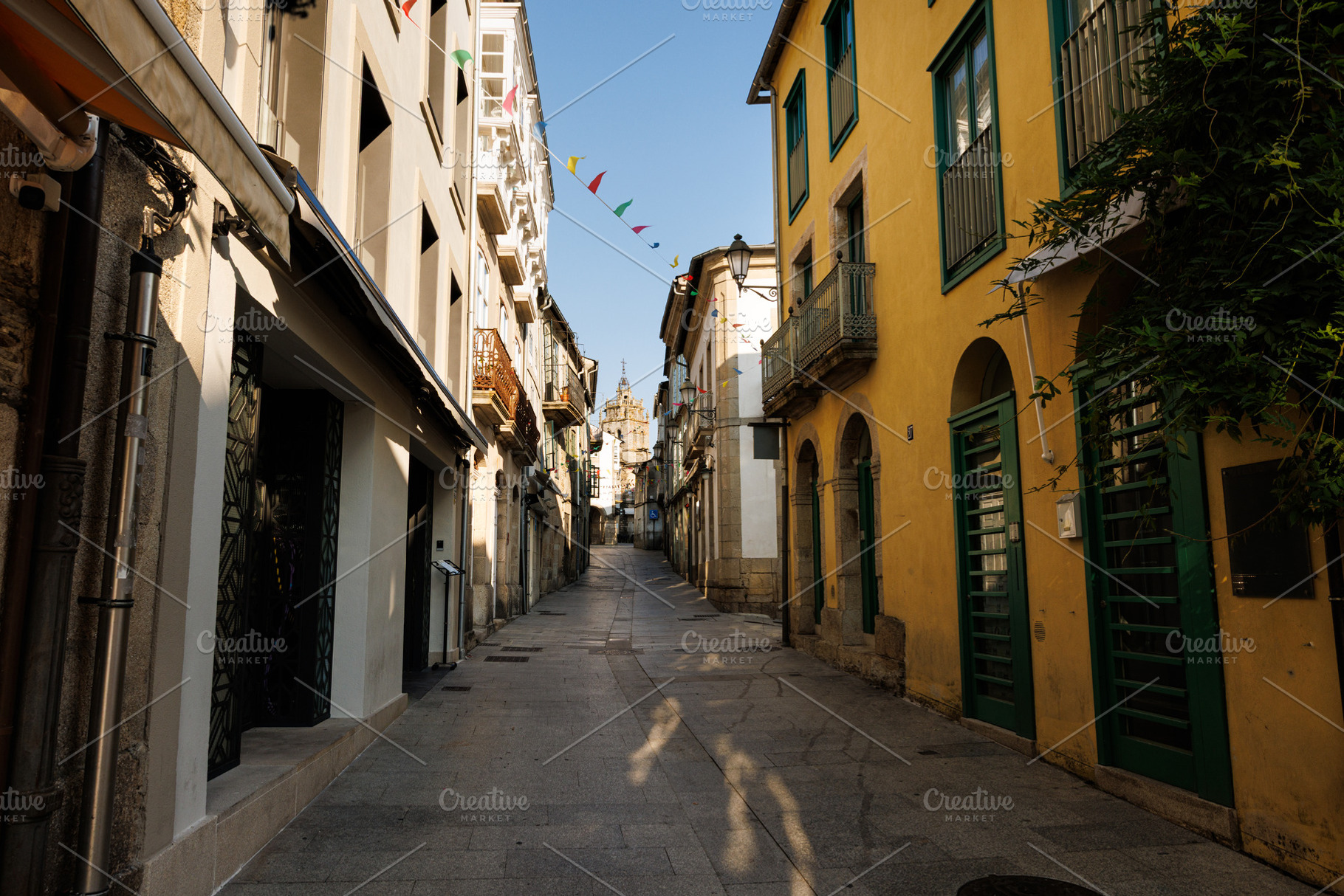 Narrow Cobblestone Street with Historic Buildings and Distant Be, an Architecture Photo by Bepslabor