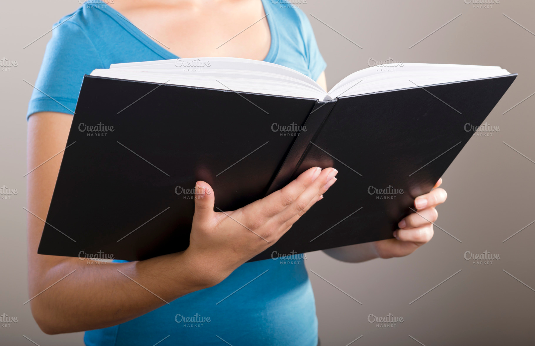 Woman With Book, a Person Photo by THP Creative