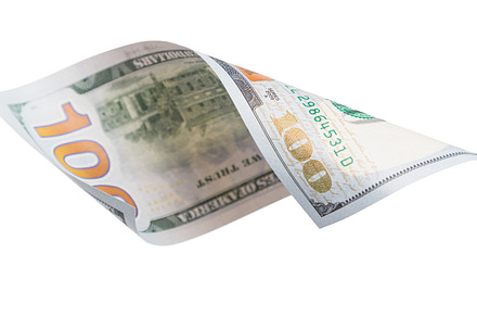 One Hundred Dollar Bill Falling or Floating on Empty Background., a Photo by Andy Dean Photography