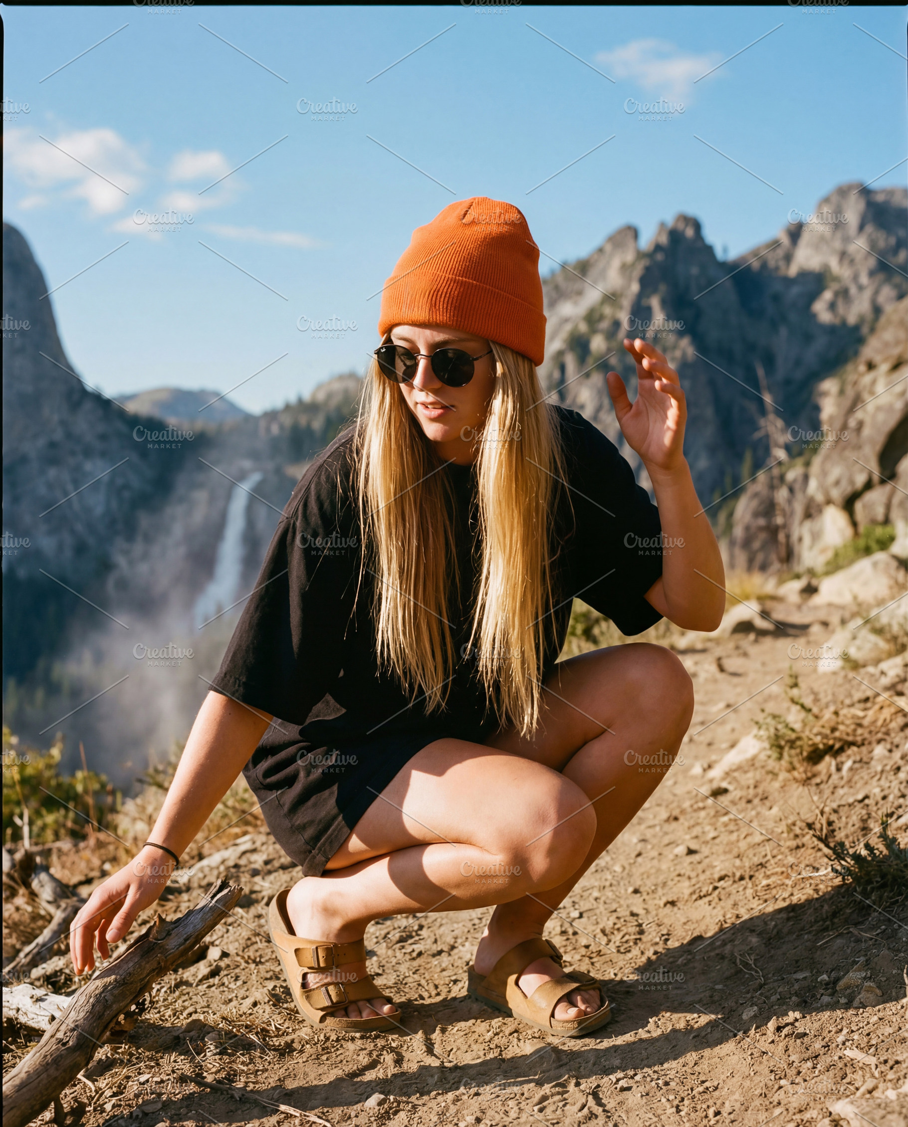 Young woman hiker at scenic mountain, a Person Photo by Virgo Studio