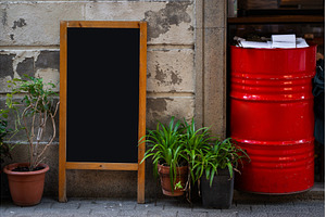 Blank menu board easel standing on a, an Architecture Photo by volodymyrshtun13795